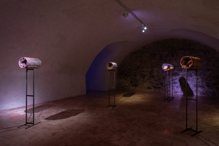 Natália Trejbalová, Fantastic Voyage pt. 1-3, 2025 — paraffin, beeswax, acrylic ink and various materials, iron stand