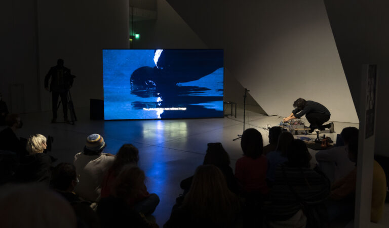 Enrique Ramirez, El lamento del pájaro y el bote invertido, 2021 — Sound performance with whistling bottles and synthesizer
